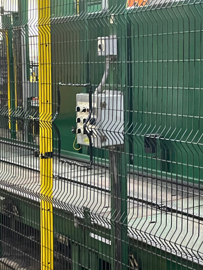 RageWire® Machine Guarding creates a safe barrier around a conveyor system at a global beverage maker's facility